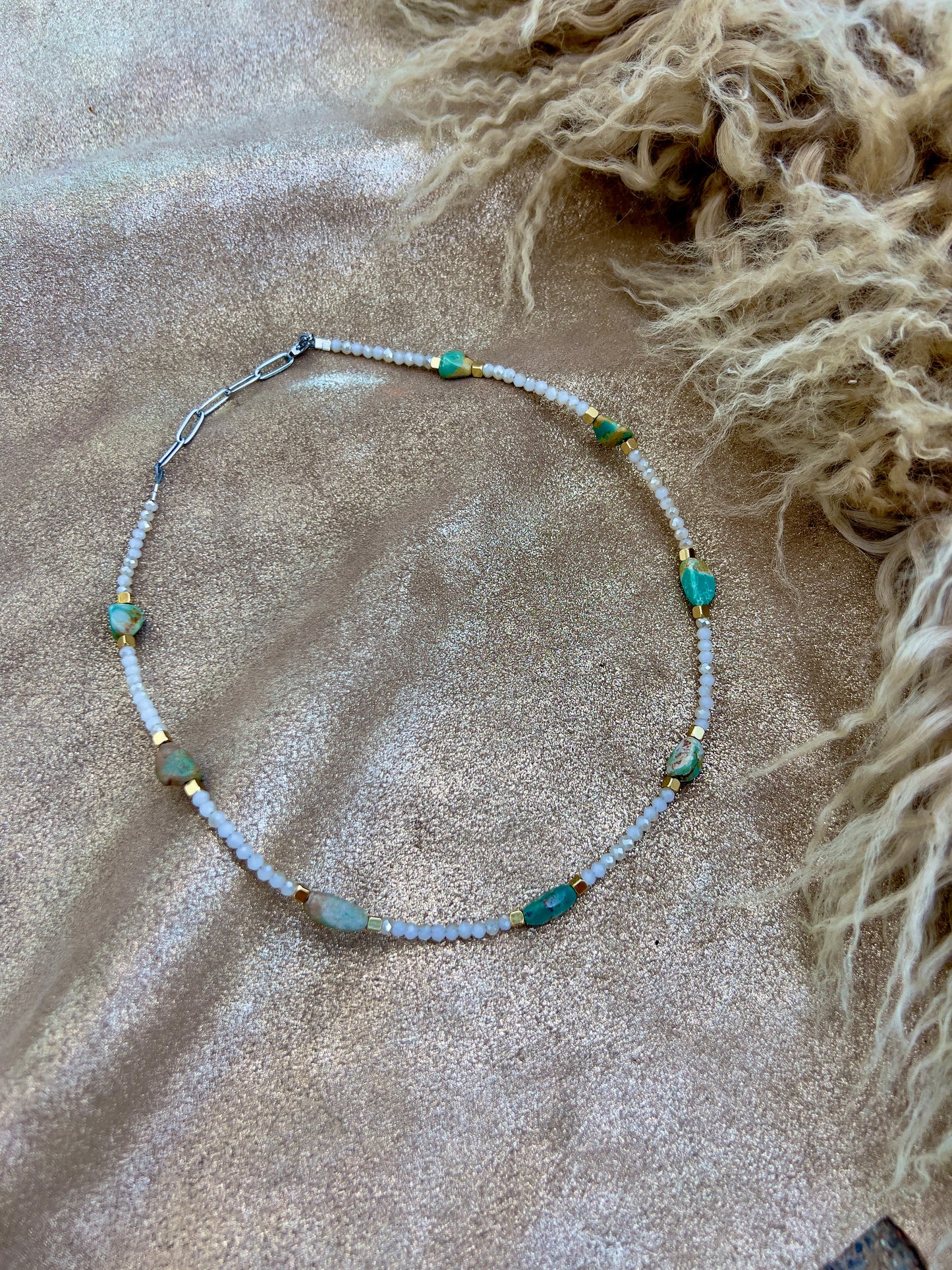 White, turquoise, and gold necklace