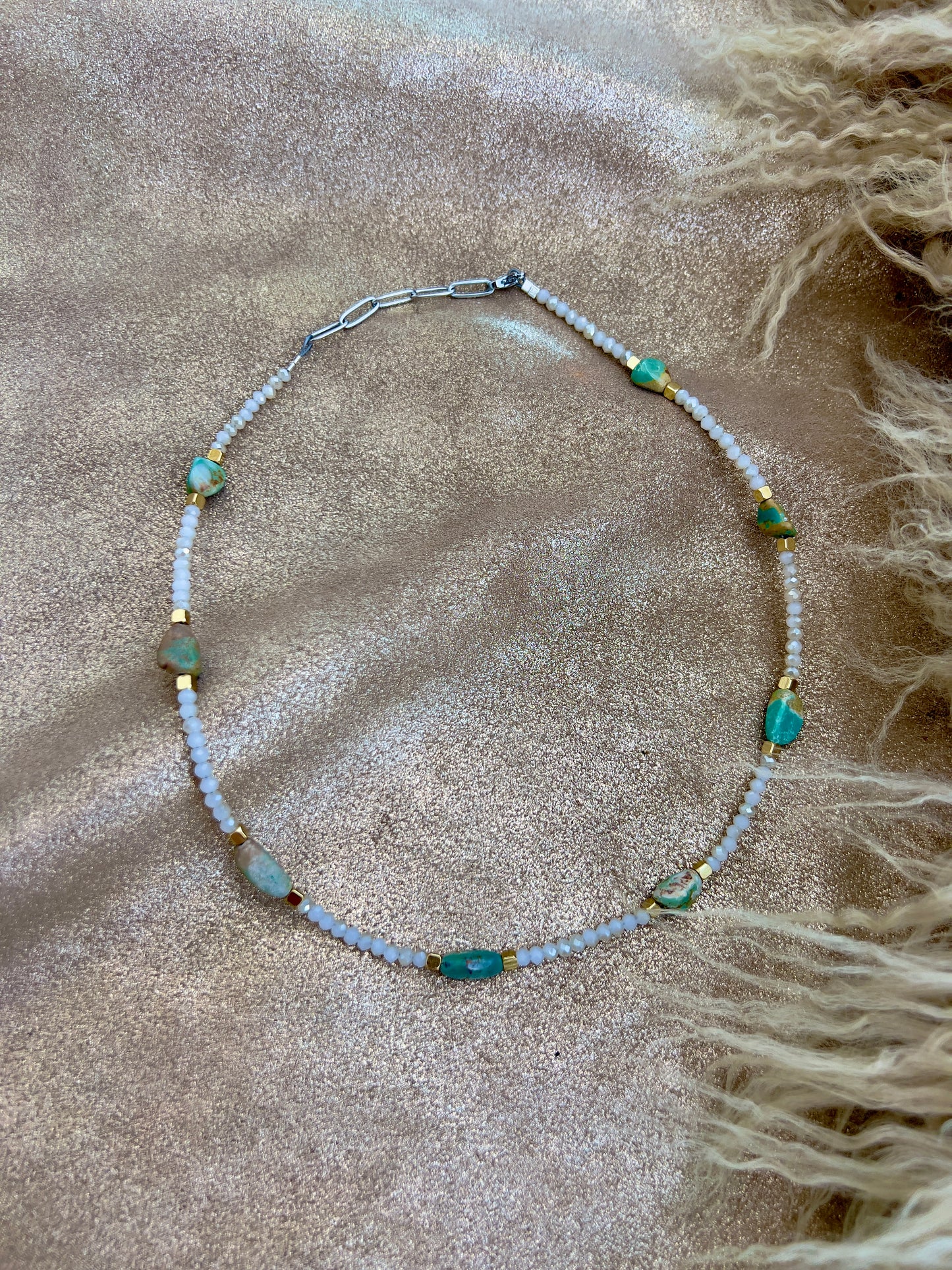 White, turquoise, and gold necklace