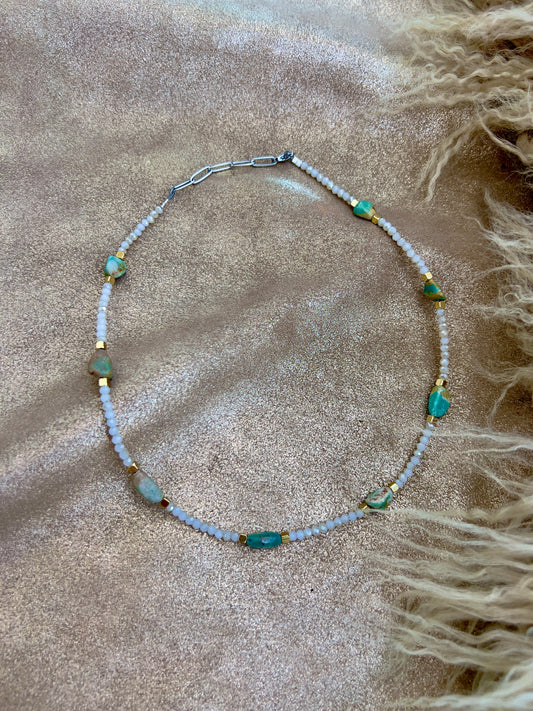 White, turquoise, and gold necklace